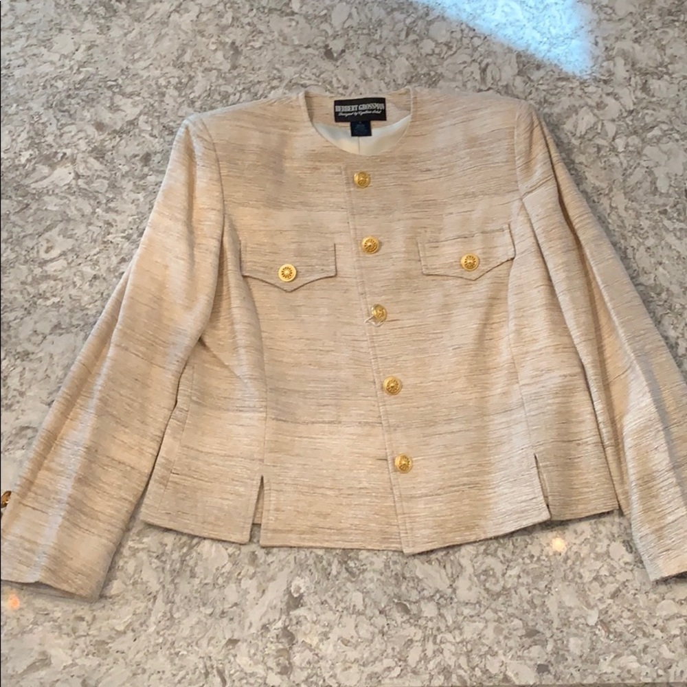 100% Silk.     Dry clean Only.    Made in Columbia